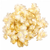 Coiled cherry blossom garland string lights glowing with warm white LEDs - thumbnail number 2