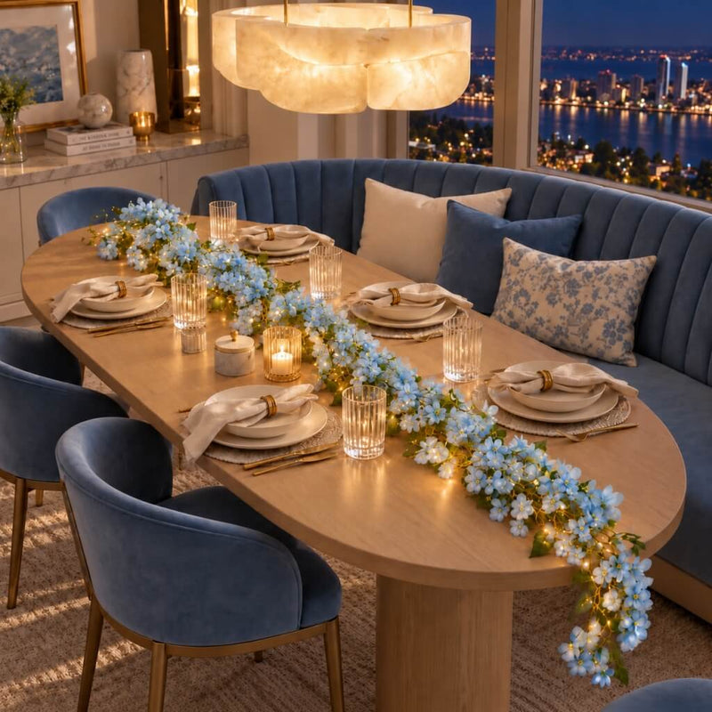 Blue jasmine flower garland with fairy lights on a dining table - thumbnail number 9