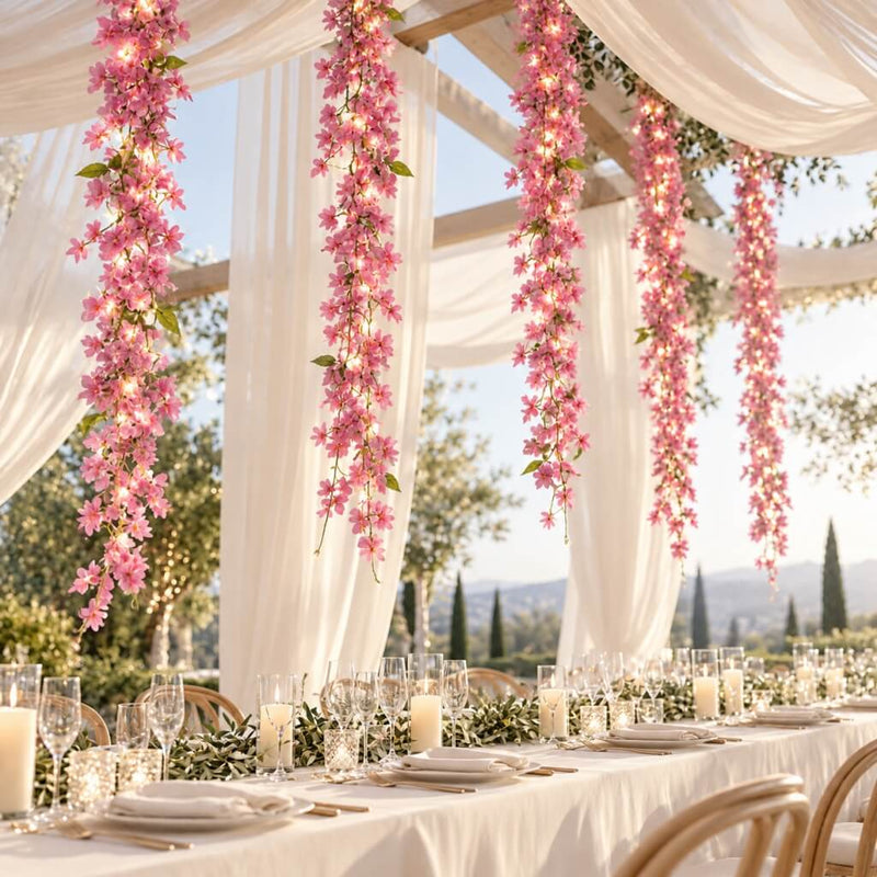 LED pink jasmine garlands hanging over an elegant outdoor wedding table - thumbnail number 5
