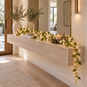 White jasmine flower garland with fairy lights on a hallway console table - thumbnail number 7