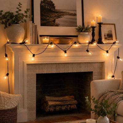 String lights draped across a fireplace mantel in a cozy living room - thumbnail number 9