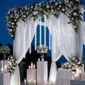 Hanging LED meteor shower string lights decorating a wedding arch - thumbnail number 5