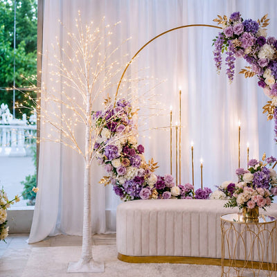 6ft lighted birch tree with warm white LEDs at a floral wedding ceremony arch - thumbnail number 2