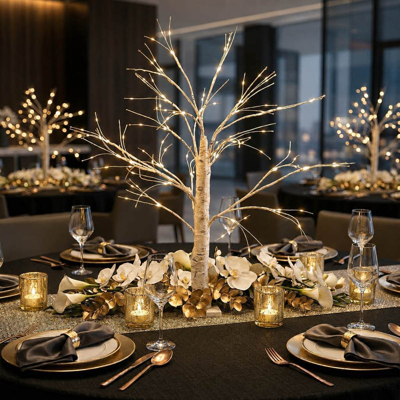 Lighted 2ft birch tree centerpiece on a formal dining table with flowers and warm LED lights - thumbnail number 5