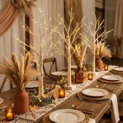 Three 2ft lit birch trees with warm LED fairy lights on a decorated boho dining table - thumbnail number 4
