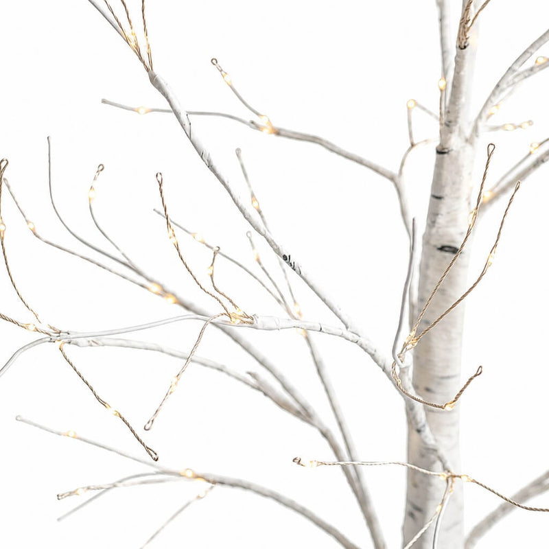 2ft white birch tree with warm white LED fairy lights on a white backdrop - thumbnail number 2