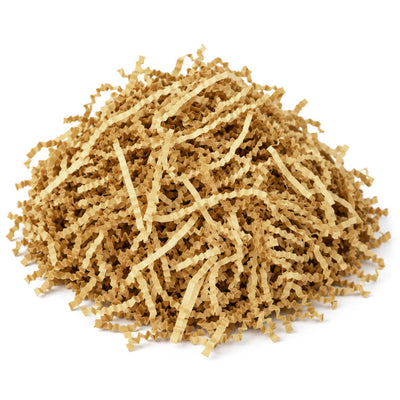 Natural brown crinkle-cut paper shred basket filler piled on a white background - thumbnail number 1