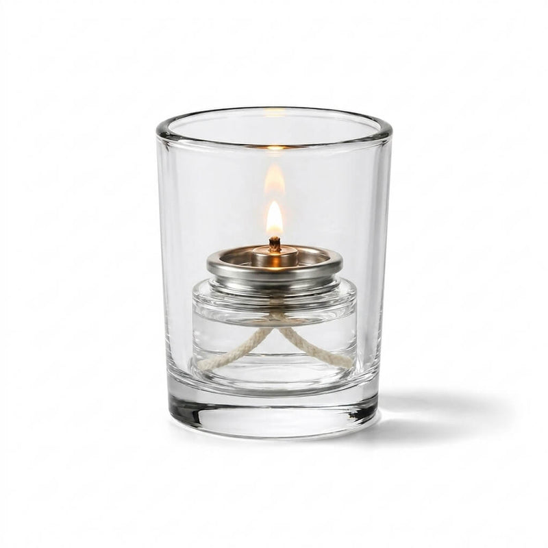Lit Liquid Paraffin Fuel Cell inside clear glass hurricane holder on white background - thumbnail number 3