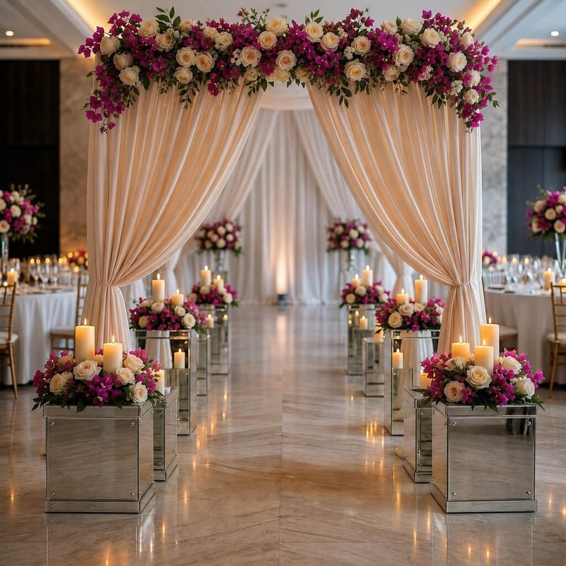 Silver mirrored acrylic display boxes topped with candles and flowers lining a wedding aisle - thumbnail number 6