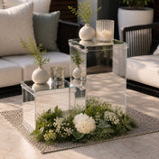 Two silver mirrored acrylic display boxes styled with floral arrangements on a patio table - thumbnail number 9