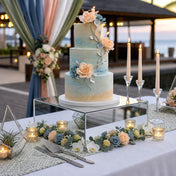 Silver mirror finish acrylic riser displaying a multi-tier wedding cake decorated with floral accents - thumbnail number 5