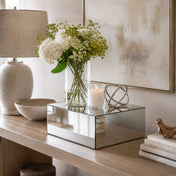 Silver mirror finish acrylic pedestal riser styled with a vase of white flowers and a candle - thumbnail number 7