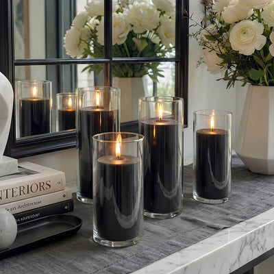Black candles in glass cylinders on a decorated table - thumbnail number 6
