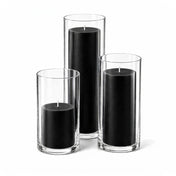 Three black pillar candles inside clear glass cylinder holders of varying heights - thumbnail number 1