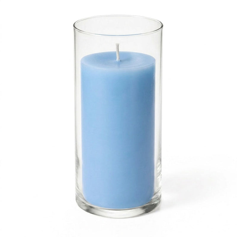 Tall glass candle holder with a light blue pillar candle - thumbnail number 1
