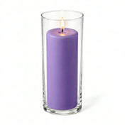 Lavender pillar candle burning inside a cylindrical glass vase - thumbnail number 2