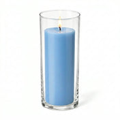 Lit light blue pillar candle inside a clear glass cylinder vase - thumbnail number 2