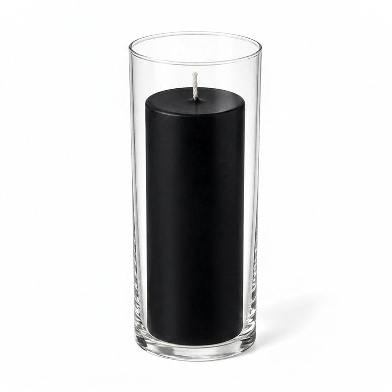 Black pillar candle inside a clear glass cylinder vase - thumbnail number 1