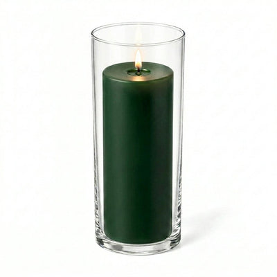 Dark green pillar candle burning inside a cylindrical glass vase - thumbnail number 2