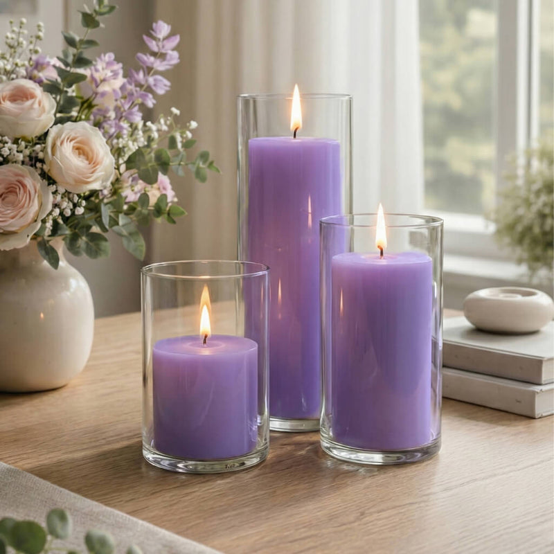 Lavender pillar candles in clear glass holders on elegant living room table - thumbnail number 6