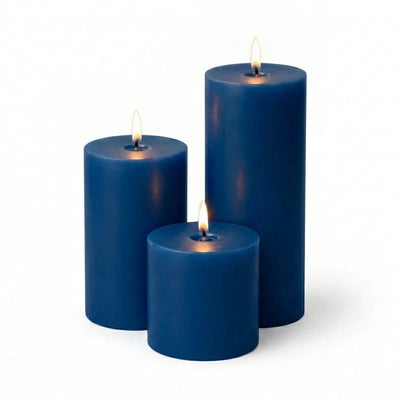 Three blue candles of different sizes on a white background - thumbnail number 2
