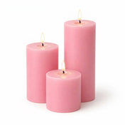 Three pink candles of different sizes on a white background - thumbnail number 2