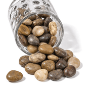 Glass jar spilling out polished natural assorted design decorative stones - thumbnail number 1