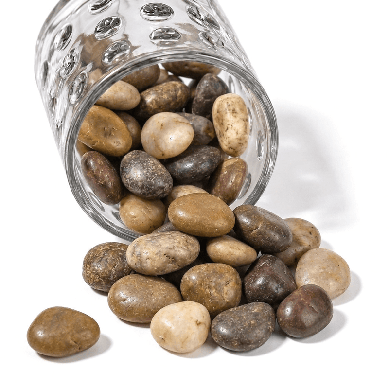 Glass jar spilling out polished natural assorted design decorative stones - thumbnail number 1