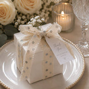 White gift box tied with linen ribbon, flowers, and a thank you tag - thumbnail number 3