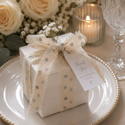 White gift box tied with linen ribbon, flowers, and a thank you tag - thumbnail number 3