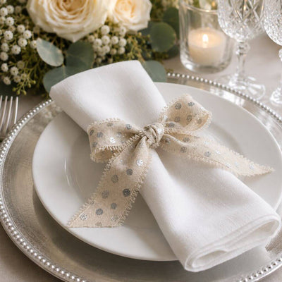 White napkin tied with a silver dot linen ribbon on a plate - thumbnail number 6