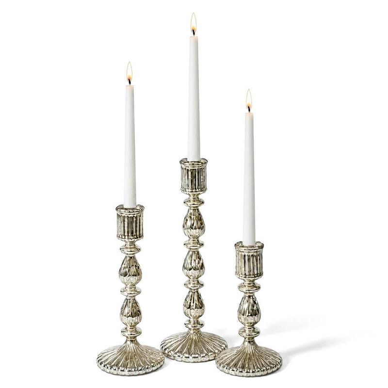 Three lit candles in a Ribbed Unique Mercury Glass Taper Candle Holder on a white background - thumbnail number 3