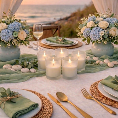 Elegant beach wedding table centerpiece with ivory candles inside clear Frosted Votive Holders - thumbnail number 5