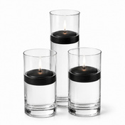 Three black floating candles glowing inside glass cylinders - thumbnail number 1