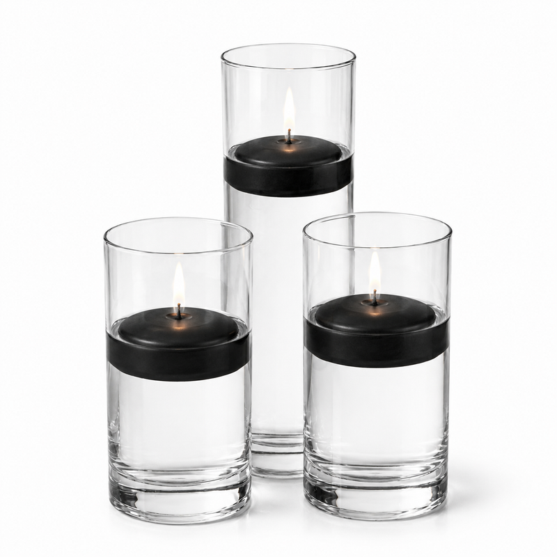 Three black floating candles glowing inside glass cylinders - thumbnail number 1