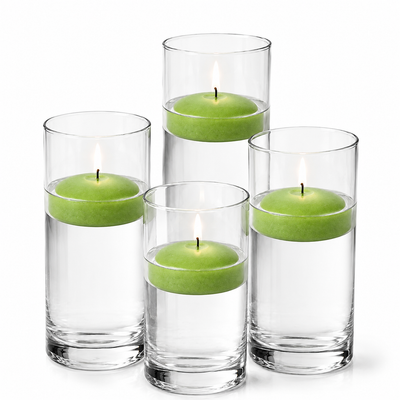 Four glass cylinders filled with water hold lit green floating candles - thumbnail number 1