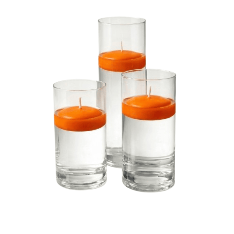Three orange floating candles in glass cylinders on a white background - thumbnail number 1