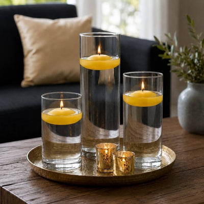 Three glass cylinder vases with lit yellow floating candles on a tray - thumbnail number 7