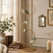 Gold metal 4-tier hoop pillar stand decorated with white flowers - thumbnail number 9