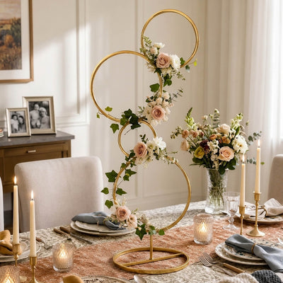 Gold metal 4-tier hoop pillar stand styled with roses and greenery as a dining centerpiece - thumbnail number 10