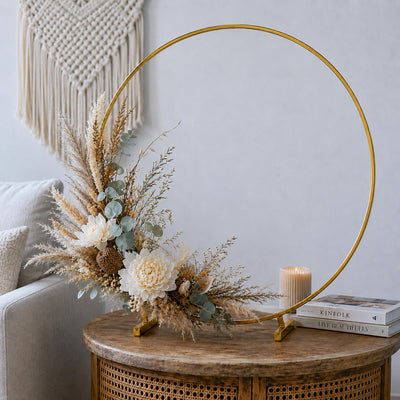 Gold hoop centerpiece with dried pampas grass and white flowers on a boho table - thumbnail number 9