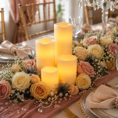 Assorted white flameless candles with warm glow and rose centerpiece - thumbnail number 5