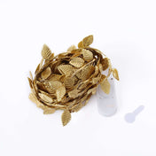 Metallic gold rose leaf LED garland vine lights with warm white glow on white background - thumbnail number 1
