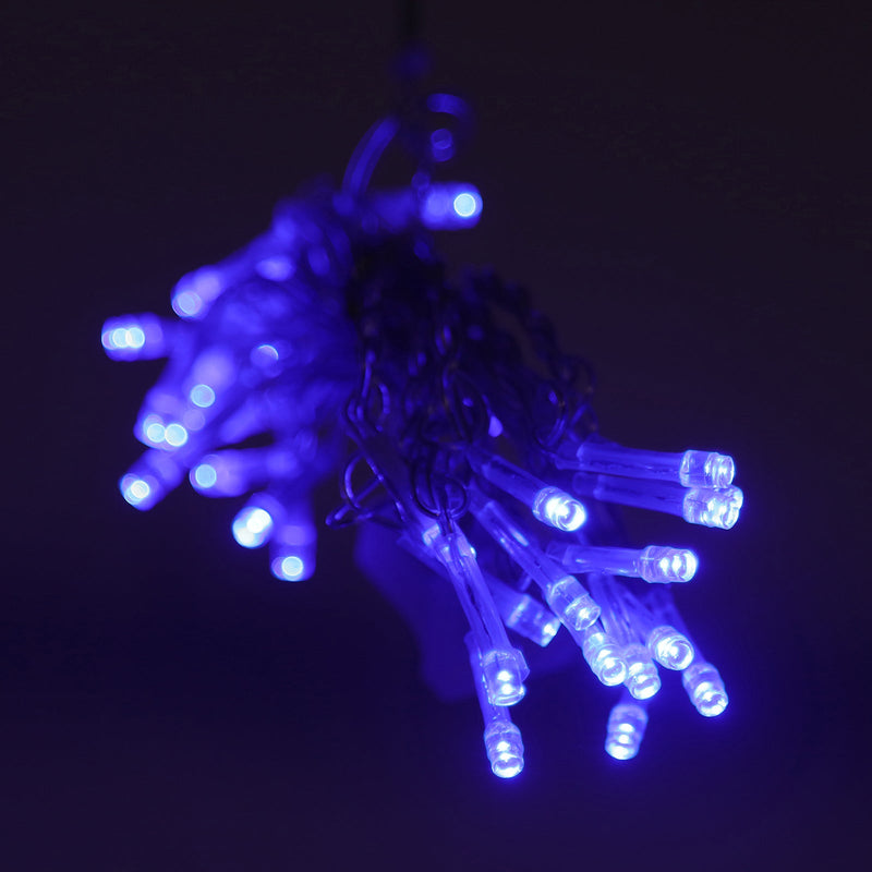 A bundled cluster of glowing blue LED fairy lights against a dark background - thumbnail number 1