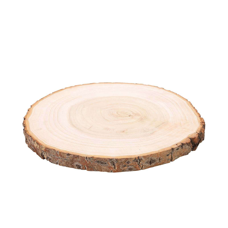 Natural round wood slice with bark edge for rustic table decor on a white background - thumbnail number 1