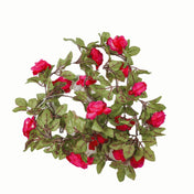 Pink silk rose garland with green leaves and vine lights on a white backdrop - thumbnail number 1