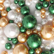 Assorted green, gold, and white pearl beads vase fillers on white background - thumbnail number 1