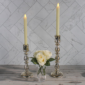 Richland Ivory LED Taper Candles 9.75" on a table
